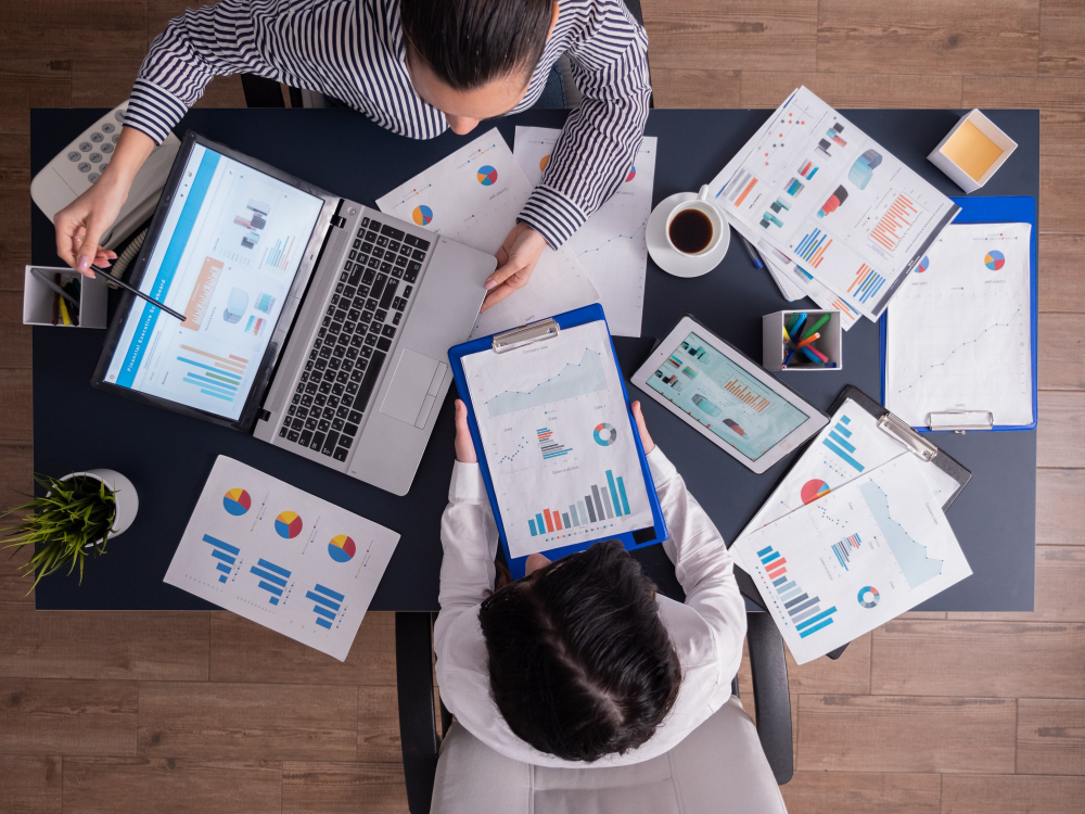 From Leads to Sales: How a Google Ads Agency in Sydney Can Maximise Your Conversions 1 Professionals at a Google Ads agency analysing performance data, conversion funnels, and ad campaign metrics.